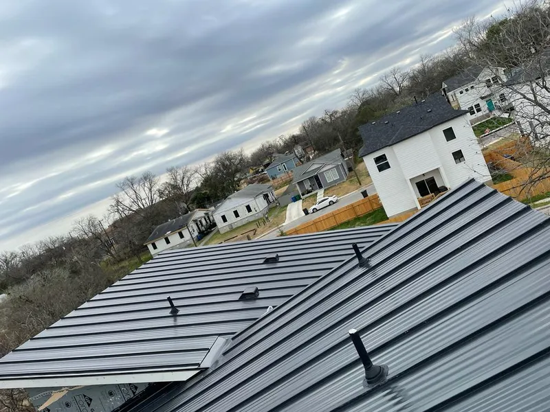 Standing seam metal roof panels with vents for Skylight Repair in Ste. Genevieve